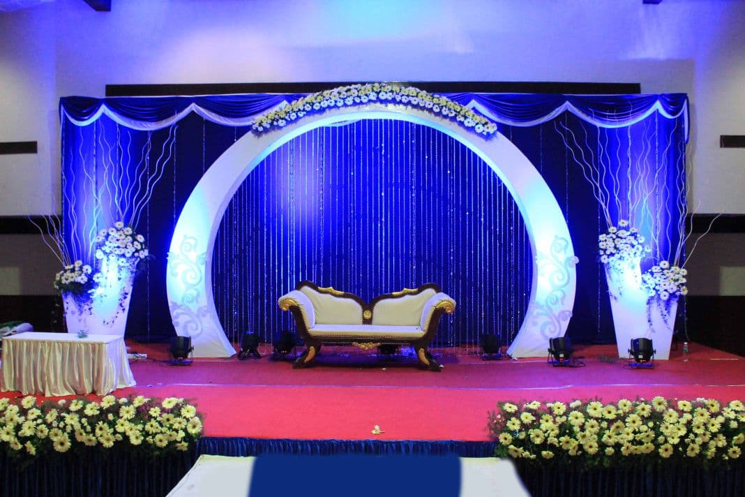 Elegant blue-themed wedding stage planned by Red Q Events in Kerala Elegant blue-themed wedding stage planned by Red Q Events in Kerala